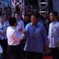 Pasangan Calon Presiden dan Wakil Presiden Koalisi Indonesia Maju Prabowo-Gibran menggunakan bus listrik. (Dok. TKN Prabowo Gibran)  